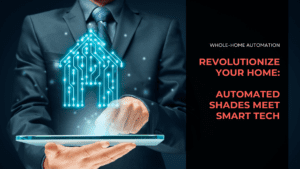 Close up of man using tablet and holographic house appears over the tablet to give a technological feel. Image text conveys The Future of Smart Living: Integrating Motorized Shades with Whole-Home Automation Systems