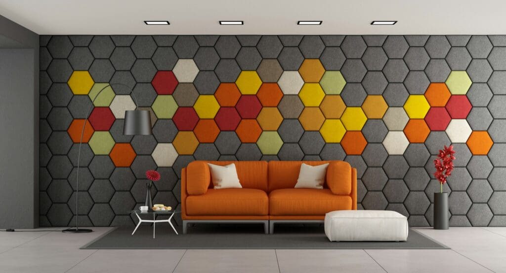 Modern living room with white sofa and colorful hexagonal panels on wall - 3d rendering